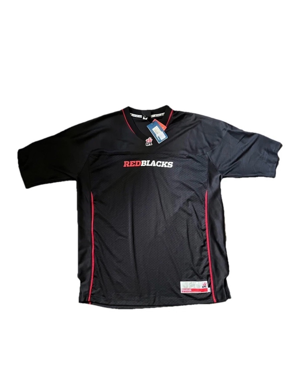Authentic Ottawa Redblacks Reebok CFL jersey in adult size 2XL.